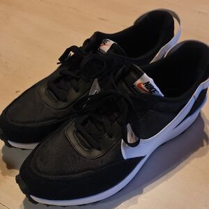 NWOT Nike Men's Black and White Athletic Sneakers.